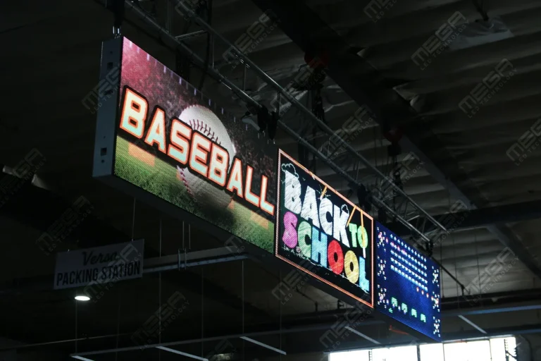 Suspended LED display panels showing promotional content inside an indoor warehouse environment