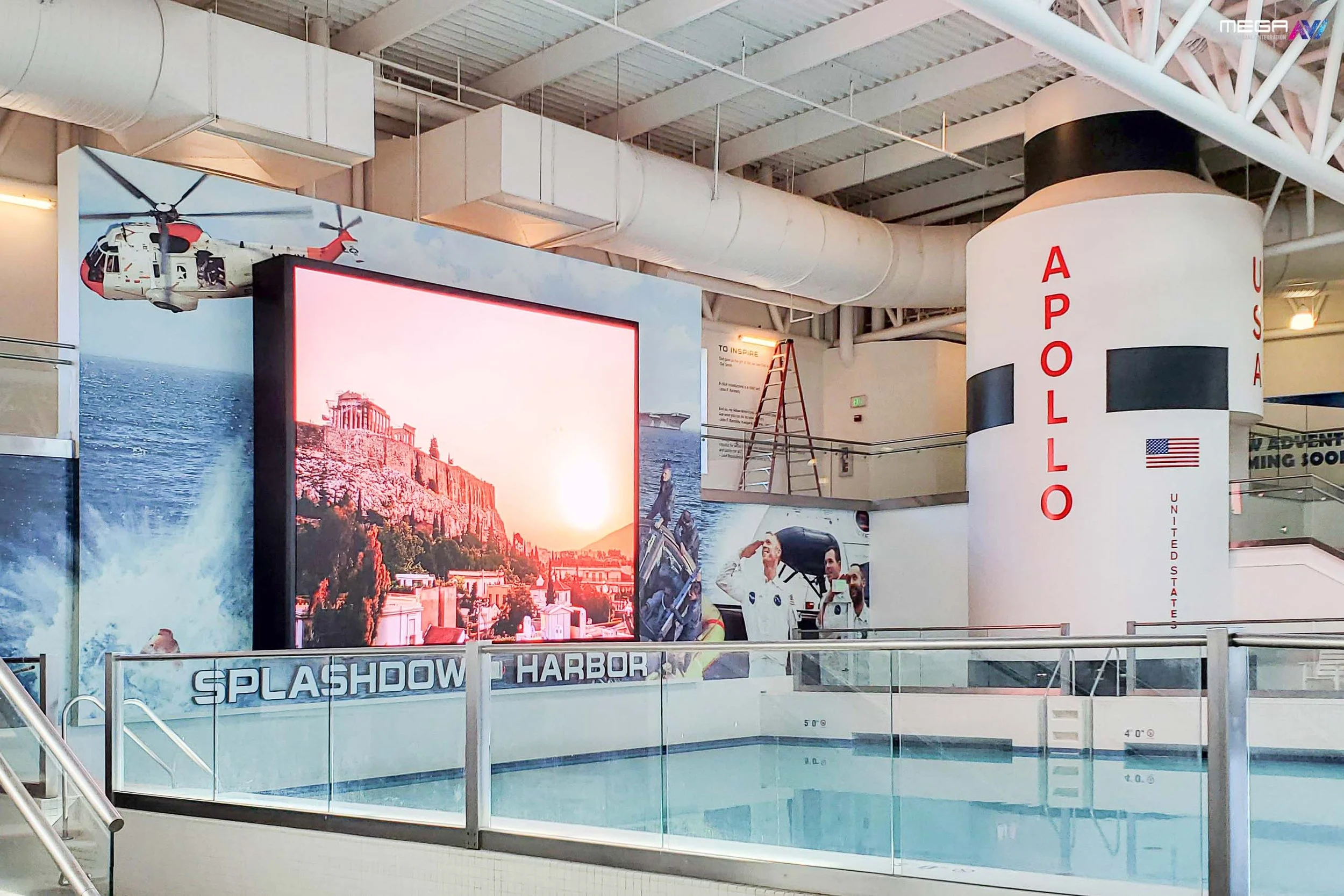 Indoor LED display wall at an aquarium exhibit in Apollo Beach Florida showing immersive visual content for visitors